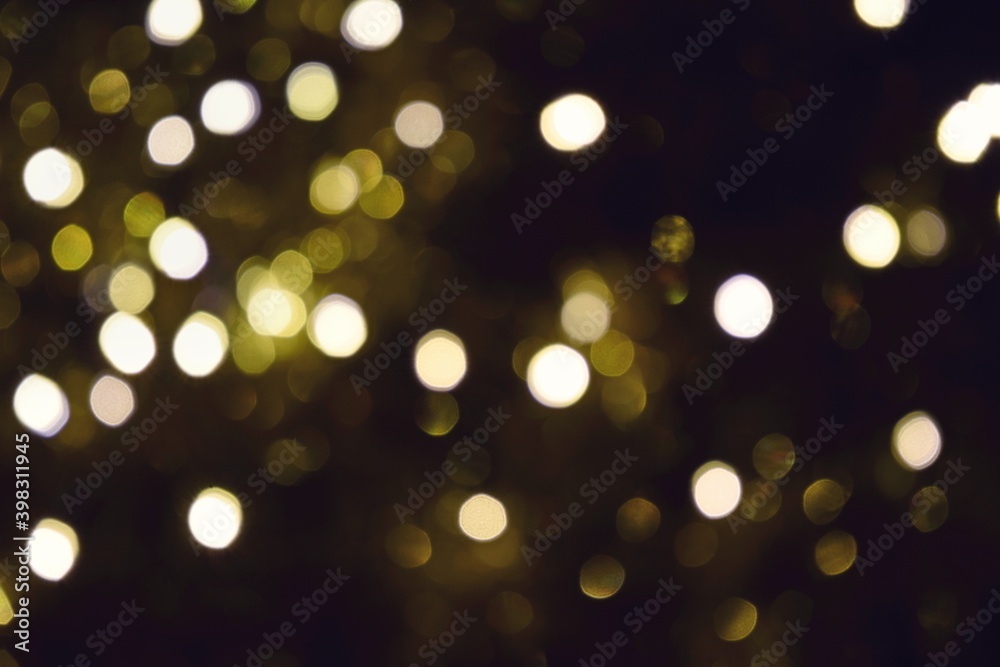 Lights blurred bokeh abstract on dark background, rozmyte światełka na ciemnym tle lampki świąteczne Lights blurred bokeh abstract on dark background, rozmyte światełka na ciemnym tle lampki świąteczne