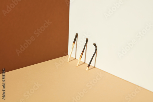 Isometric view with burnt matches and shadows.