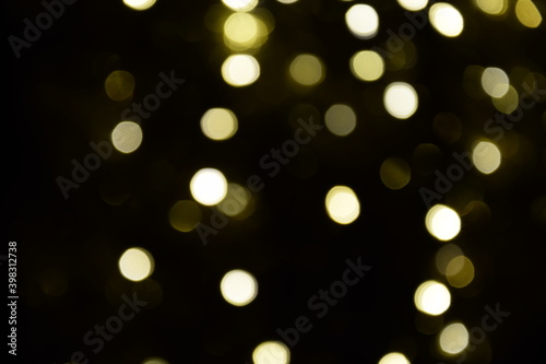 Lights blurred bokeh abstract on dark background, rozmyte światełka na ciemnym tle lampki świąteczne