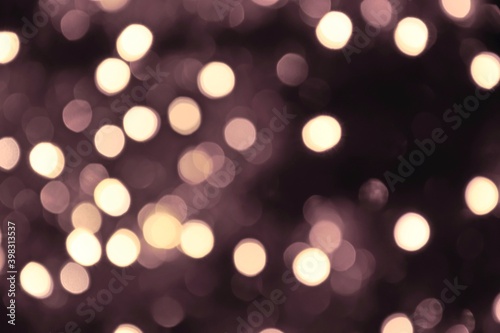 Lights blurred bokeh abstract on dark background, rozmyte światełka na ciemnym tle lampki świąteczne © Anna