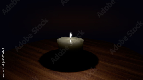 candle on a wooden table