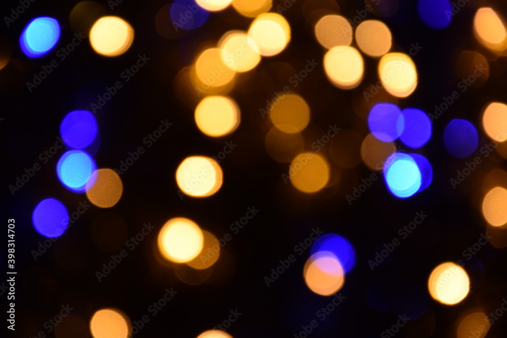 Lights blurred bokeh abstract on dark background, rozmyte światełka na ciemnym tle lampki świąteczne Lights blurred bokeh abstract on dark background, rozmyte światełka na ciemnym tle lampki świąteczne