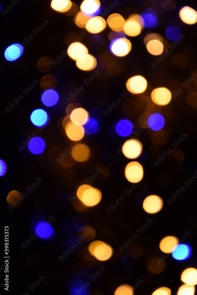 Lights blurred bokeh abstract on dark background, rozmyte światełka na ciemnym tle lampki świąteczne