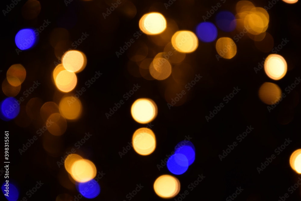 Lights blurred bokeh abstract on dark background, rozmyte światełka na ciemnym tle lampki świąteczne Lights blurred bokeh abstract on dark background, rozmyte światełka na ciemnym tle lampki świąteczne
