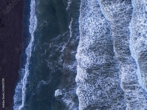 Top areal view from drone above ocean volcanic beach Kamchatka krai, Russia. photo