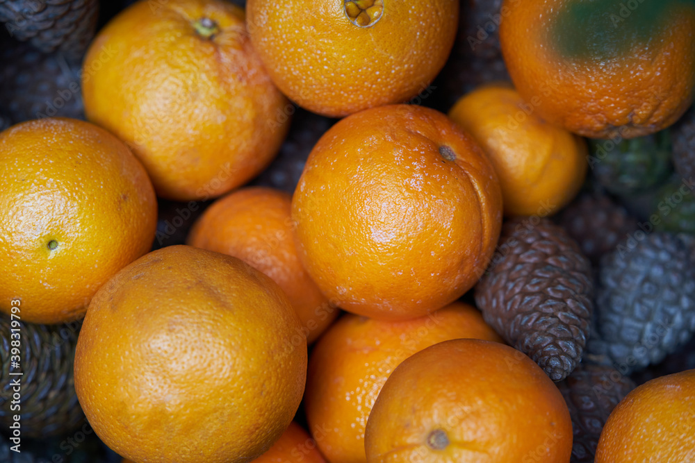 Oranges, tangerines and Christmas tree cones Oranges, tangerines and Christmas tree cones
