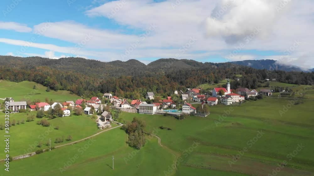 Aerial view of Slovenian village Sentviska gora in late summer day, cloudy sky Aerial view of Slovenian village Sentviska gora in late summer day, cloudy sky