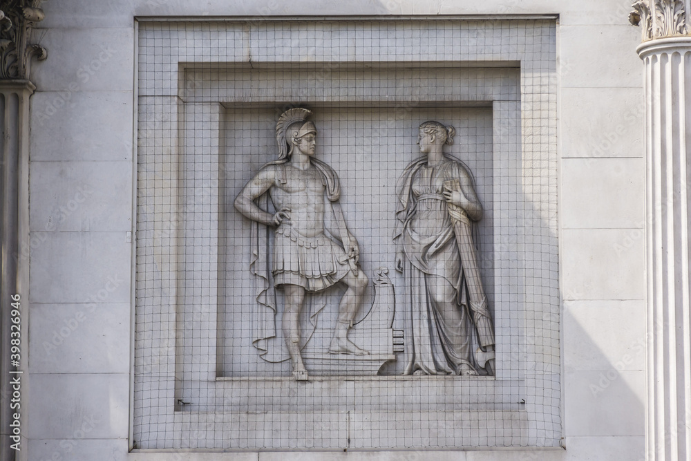 View of Marble Arch - white marble faced triumphal arch and London landmark (1827). West End, London, England. View of Marble Arch - white marble faced triumphal arch and London landmark (1827). West End, London, England.