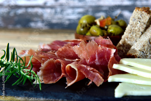 Spanish iberico serrano ham on a plater