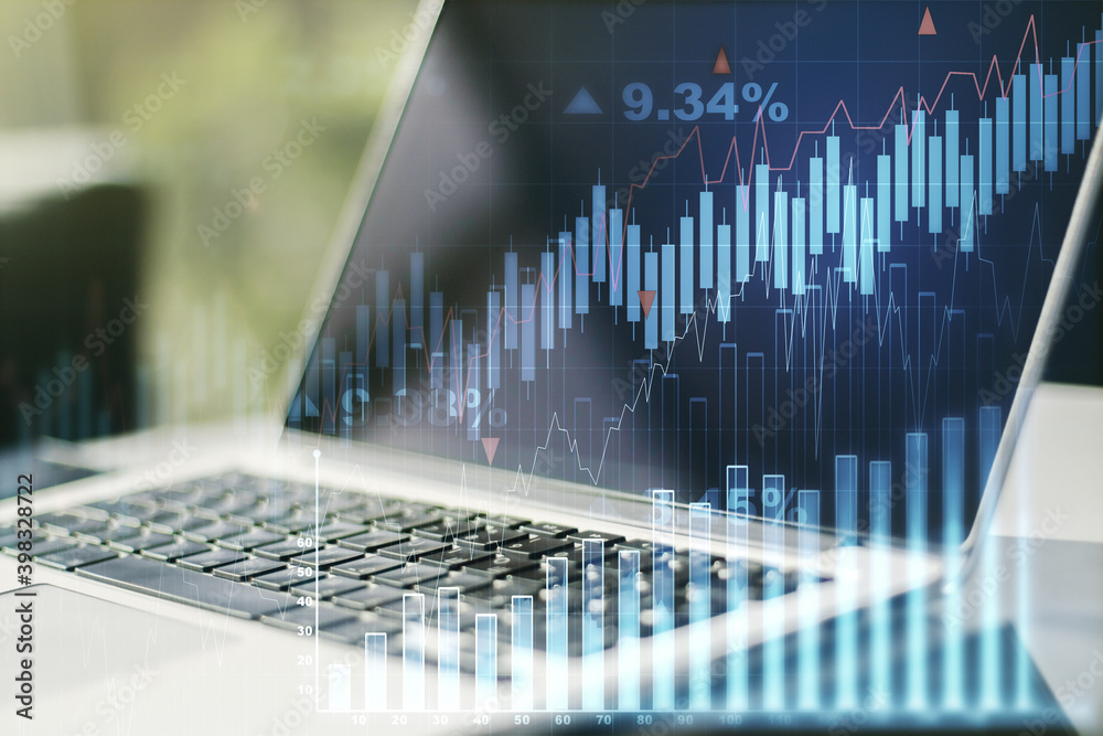 Double exposure of abstract creative financial diagram on modern laptop background, banking and accounting concept Double exposure of abstract creative financial diagram on modern laptop background, banking and accounting concept