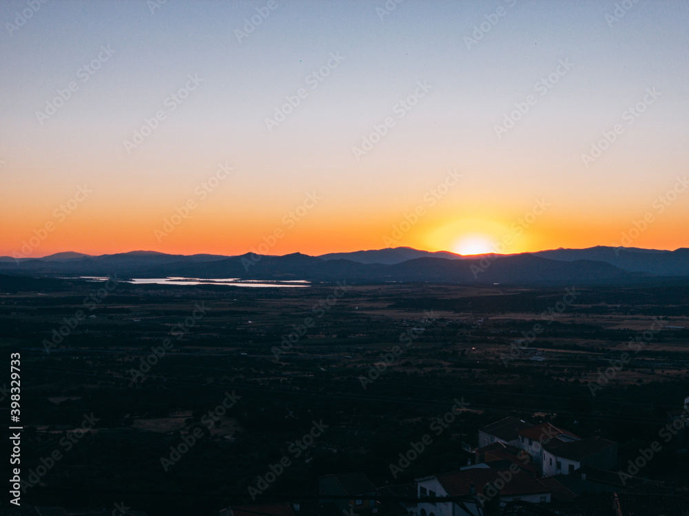 Amazing sunset over mountains in countryside Amazing sunset over mountains in countryside