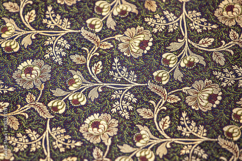 Obraz na płótnie Jacquard fabric, floral motif. Close-up of elegant and splendid silk fabric with a floral ornament. w salonie