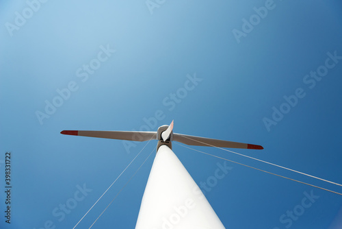 repair work on the blades of a windmill for electric power production - copy space