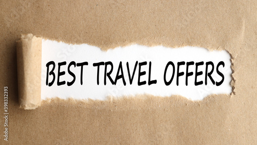 BEST TRAVEL OFFERS. word. text. on white paper on torn paper background