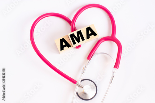 a heart made out of a stethoscope and wooden cubes with letters AMA American Medical Association