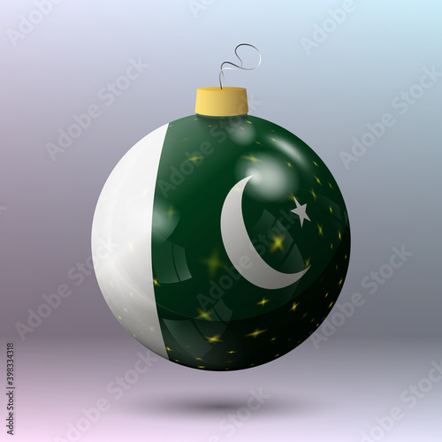 Vector - Merry Christmas ball with Pakistan flag photo