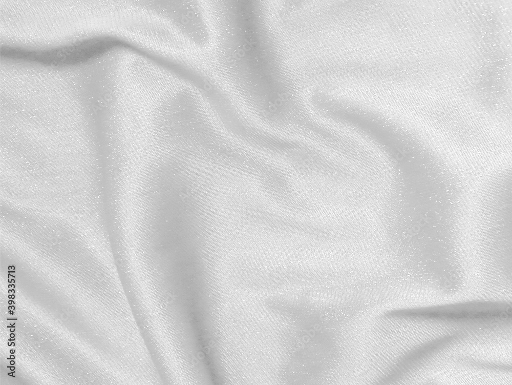 Fototapeta premium Shiny white crumpled fabric. Elegant cloth texture background