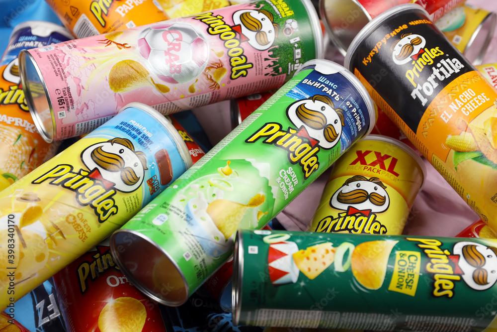 Pringles variety of flavors. Many cardboard tube cans with Pringles