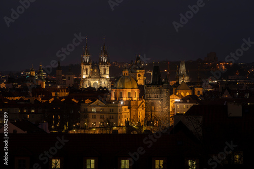 .light from street lights and a view of the city of Prague