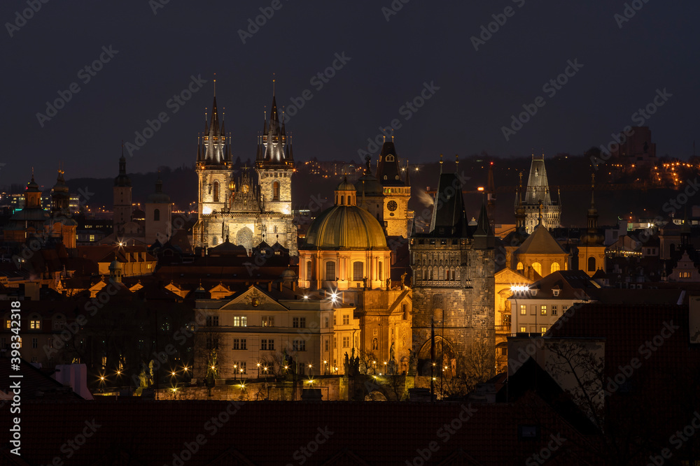 .light from street lights and a view of the city of Prague
