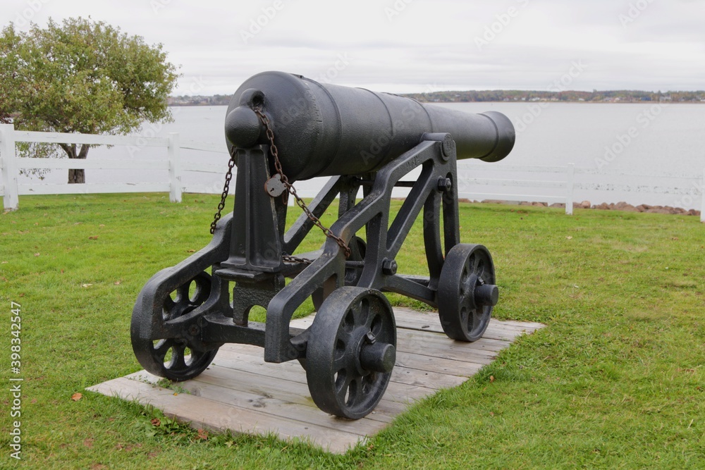 A cannon stands guard over Charlottetown Harbour from Prince Edward Battery in PEI. A cannon stands guard over Charlottetown Harbour from Prince Edward Battery in PEI.