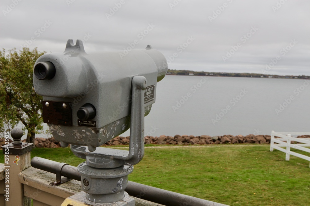 Pay per use binoculars look out into the Charlottetown harbour in PEI Canada.
