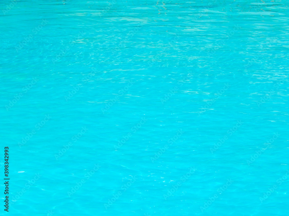 Blue swimming pool rippled water detail horizontal photo