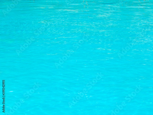 Blue swimming pool rippled water detail horizontal photo
