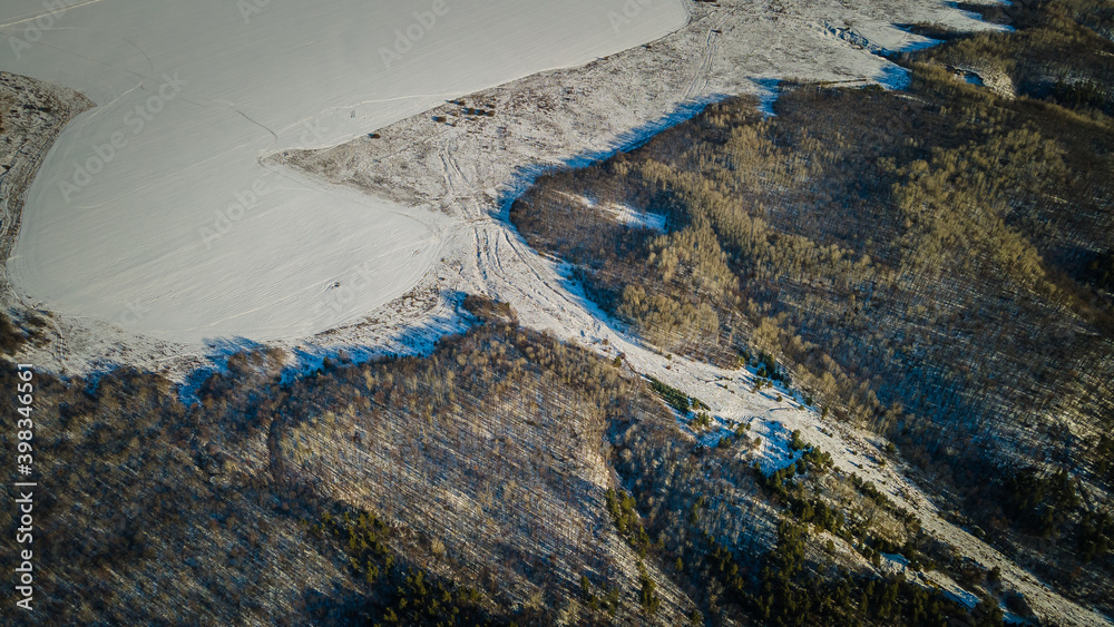 Fototapeta premium winter forest landscape made on a quadrocopter.