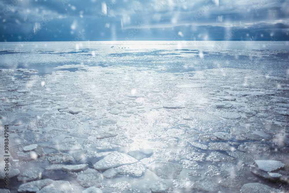 Baltic Sea on wintertime with broken ice cracks. Large pieces of floating ice driven into the seaside. Pack Ice builds up the icebergs. Baltic Sea on wintertime with broken ice cracks. Large pieces of floating ice driven into the seaside. Pack Ice builds up the icebergs.