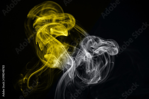Trend colors of the year 2021, smoke on black background.