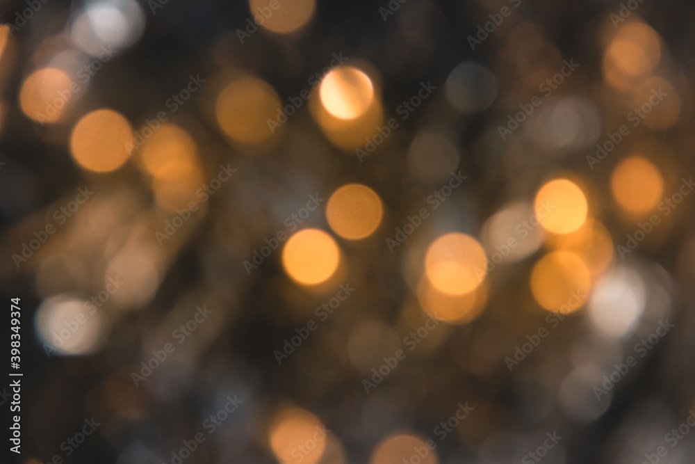 the shine of New Year's lanterns and Christmas tinsel out of focus