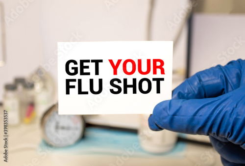 Get Your Flu Shot card in hands of Medical Doctor