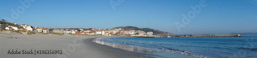 panorama banner view of the beach and Galician town of Laxe in northern Spain