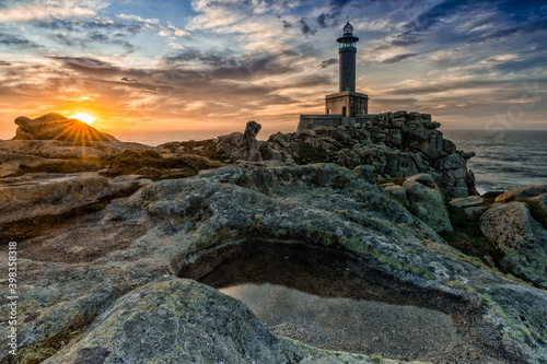 beautiful sunset at the Punta Nariga lighthouse in Galicia