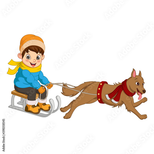 Cute little kid rides sledge pulled by a dog