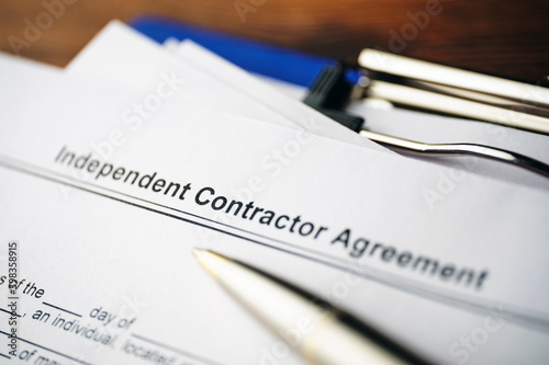 Legal document Independent Contractor Agreement on paper close up