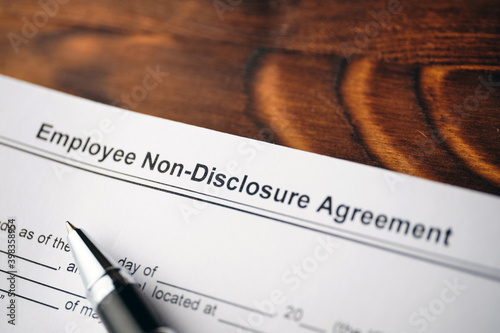 Legal document Employee Non-Disclosure Agreement on paper close up photo