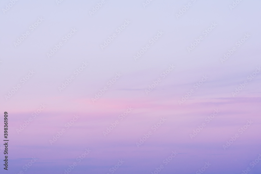 A view of the sky at sunset in blue pinks and violet colors. A view of the sky at sunset in blue pinks and violet colors.