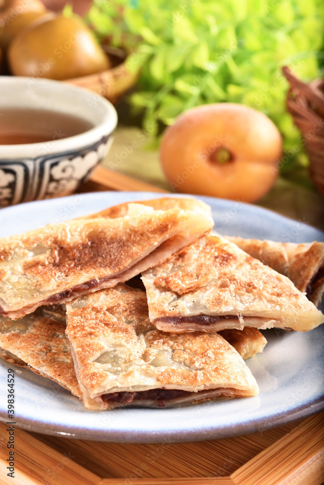 Fried pancakes filled with filling red bean paste Fried pancakes filled with filling red bean paste
