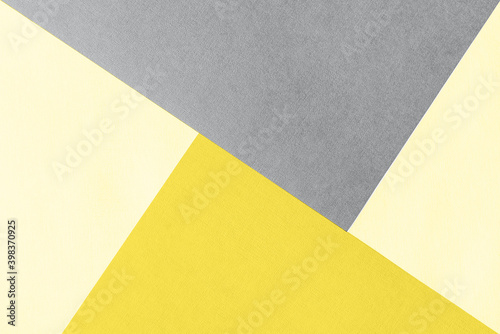 Paper for pastel overlap in trendy yellow and grey colors for background, banner, presentation template. Color 2021 concept. Creative modern background design in trendy colors.