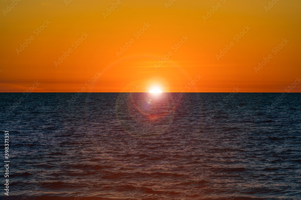 Sunset on the beach. Selective focus. Sunset on the beach. Selective focus.