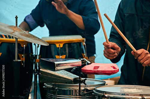 Valokuva hands and the percussion section at a symphonic concert