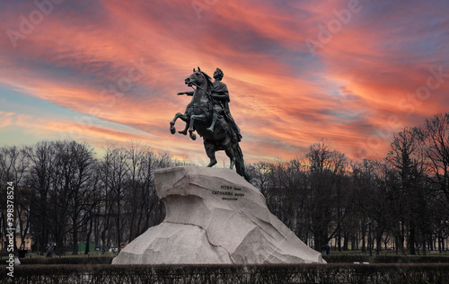 Monument of Russian emperor Peter the Great, known as The Bronze Horseman against the background of a colorful sunset, Saint Petersburg , Russia