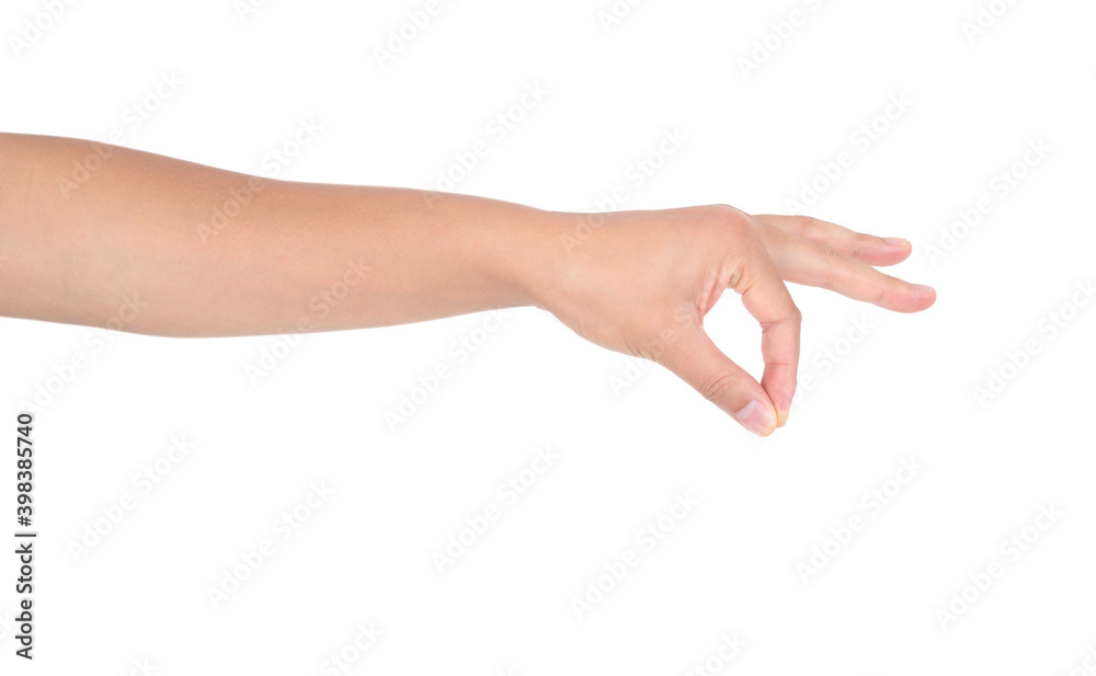 A hand pinching something in front of a white background A hand pinching something in front of a white background