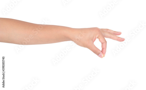 A hand pinching something in front of a white background