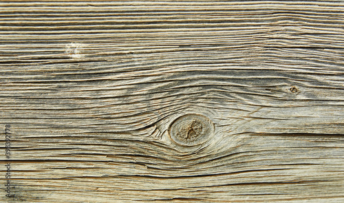 Old gray vintage grunge background from horizontal wooden planks.