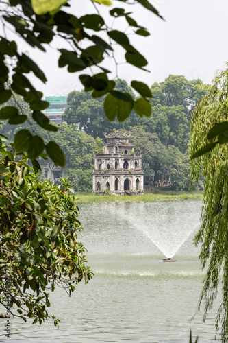 Hanoi Vietnam August 18th 2018 : The Turtle tower situated on an island in Hoan Kiem Lake in Hanoi, Vietnam photo