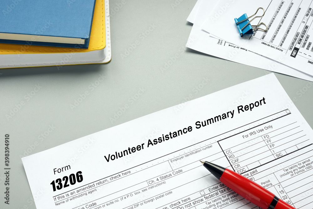 Business concept about Form 13206 Volunteer Assistance Summary Report with inscription on the sheet. Business concept about Form 13206 Volunteer Assistance Summary Report with inscription on the sheet.