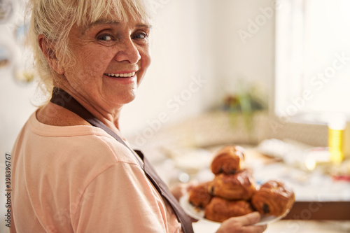 Grandma posing with her special home-baked goods